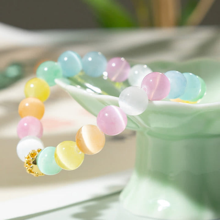 Buddha Stones 中空デザインのマルチカラーキャッツアイラウンドビーズ幸運を呼ぶブレスレット - image 1