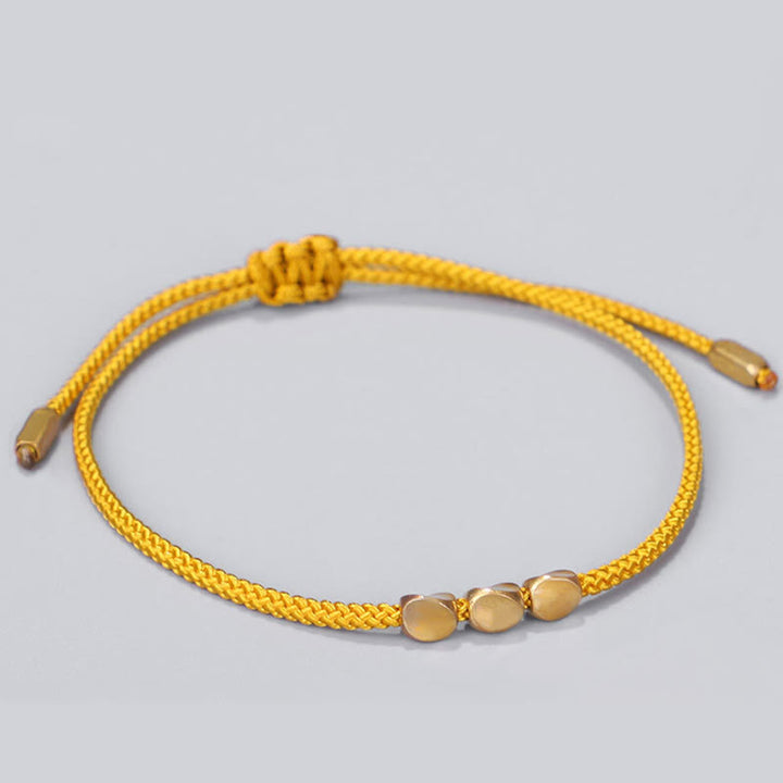 Buddha Stones 青と黄色の糸、金色の銅ビーズを使用したヒーリングブレスレット3個セット - image 2