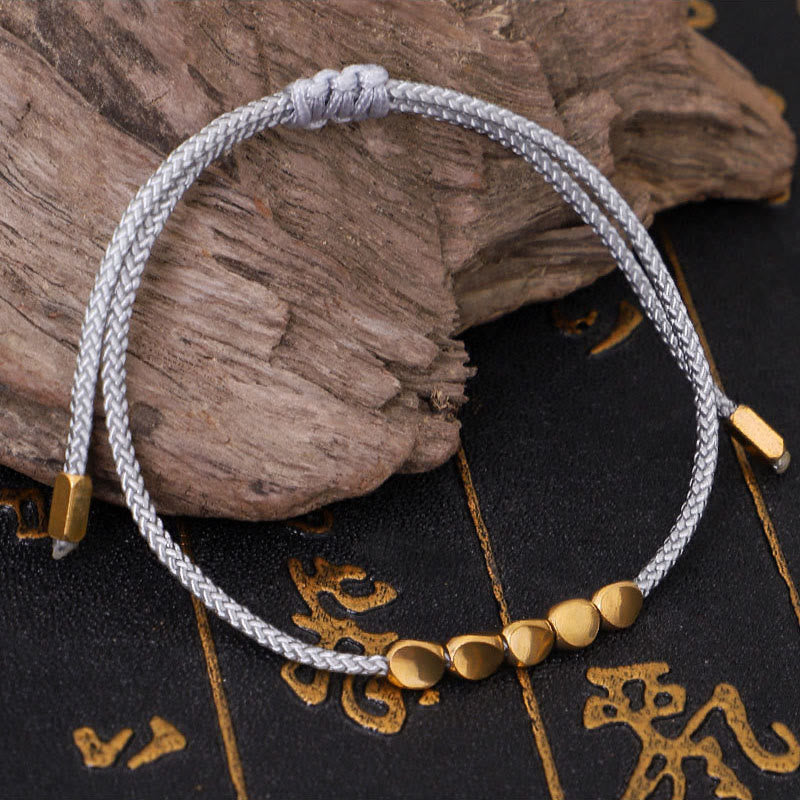 Buddha Stones 青とグレーの糸に金色の銅ビーズをあしらったセルフケアブレスレット（3個セット） - image 3