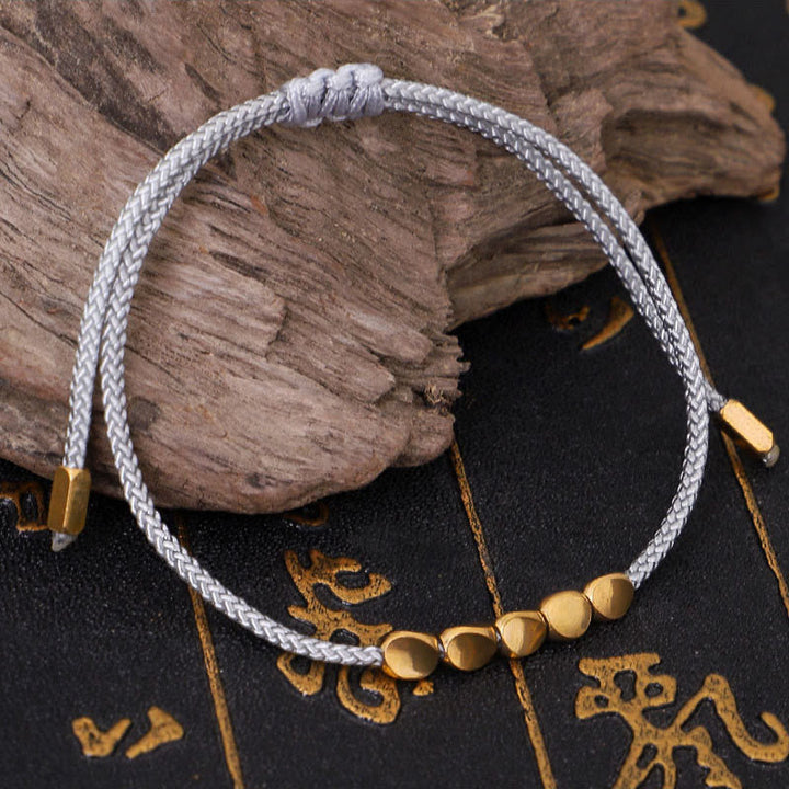 Buddha Stones 青とグレーの糸に金色の銅ビーズをあしらったセルフケアブレスレット（3個セット） - image 3