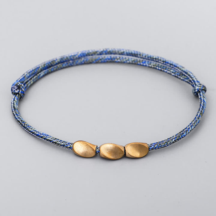 Buddha Stones 複数の色の糸を使った金色の銅ビーズのバランスブレスレット - 濃い青色 - image 10