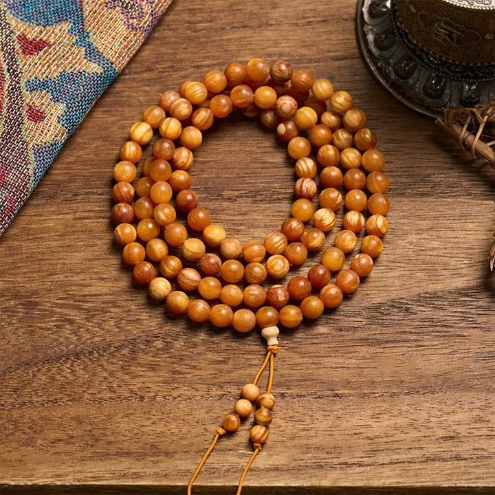 Buddha Stones 樹脂を豊富に含んだ松材を使用した、穏やかなエネルギーをもたらす108個のビーズのマーラー数珠 - 12mm×108 - image 0