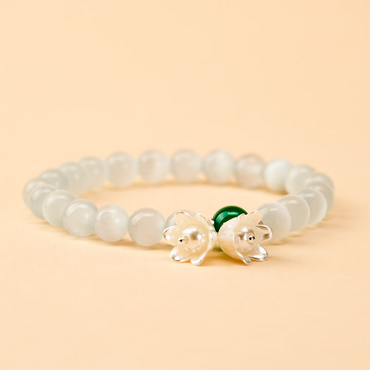 Buddha Stones 8mm ホワイトキャッツアイ ラウンドビーズ スズランの花柄幸運を呼ぶブレスレット - image 1