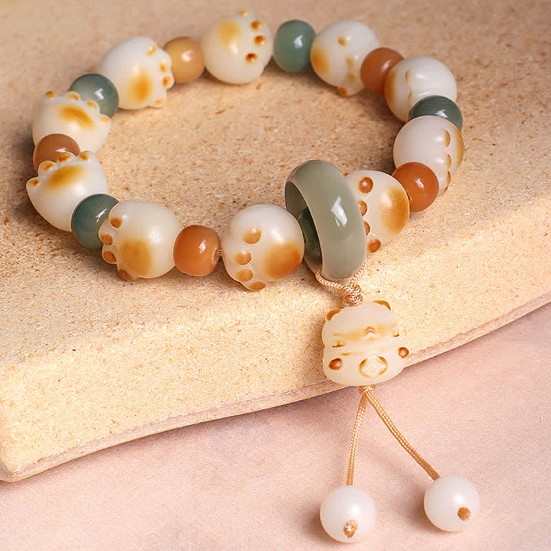 Buddha Stones 天然菩提樹の実入り猫の足跡デザインの開運財運ブレスレット - image 4
