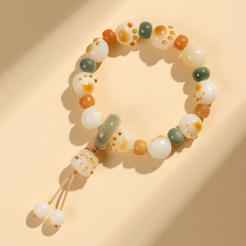 Buddha Stones 天然菩提樹の実入り猫の足跡デザインの開運財運ブレスレット - image 7