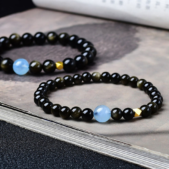 Buddha Stones 天然ゴールドの輝きを放つ黒曜石ビーズの守護ブレスレット - image 0