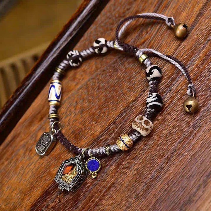 Buddha Stones 銅製の仏陀モチーフの編み込みロープブレスレット - image 1