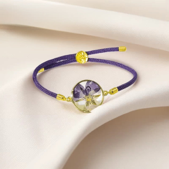 Buddha Stones 樹脂製ハンドメイド誕生花モチーフ調節可能編み込みロープブレスレット - バイオレット（手首周り：17～22cm） - image 0
