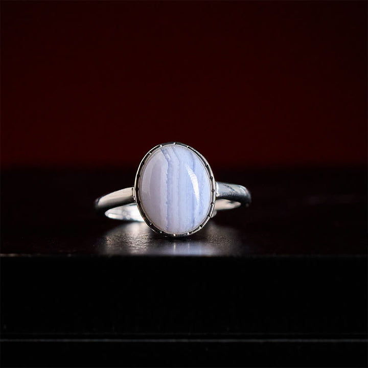 Buddha Stones 天然ブルーレースアゲートのラウンドバランスリング - image 1