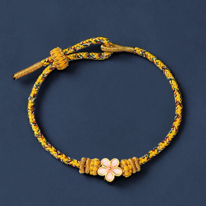 Buddha Stones 黄色の編み込みロープの花の根源を象徴するブレスレット - image 2