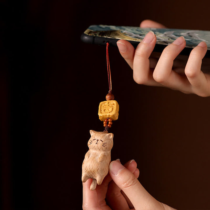 Buddha Stones ブナ材の手彫り招き猫の電話掛け装飾 - image 1