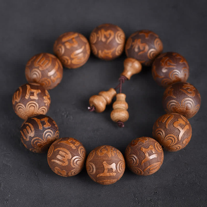 Buddha Stones 天然アベリア・ビフローラ材のハート・スートラ オム・オーム・マニ・パドメ・フムブレスレット - オーム・マニ・パドメ・フム - image 0