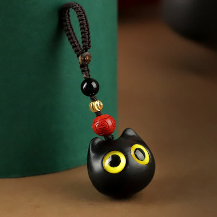 Buddha Stones 黒檀のかわいい猫のグラウンディングピースキーホルダー（手彫り） - image 2