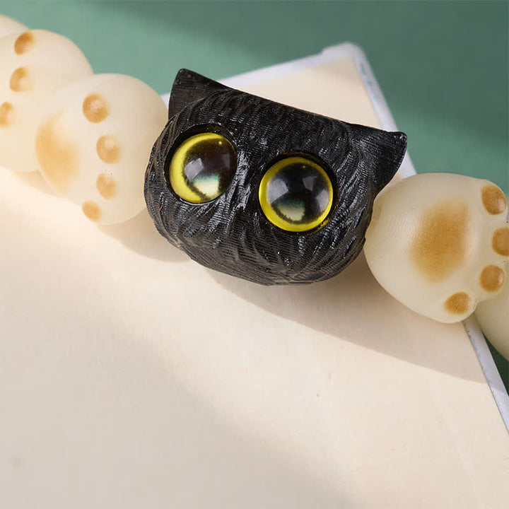 Buddha Stones 菩提樹の実と黒檀で作られた猫の足の形をした、清らかさと知恵を象徴するブレスレット - image 3