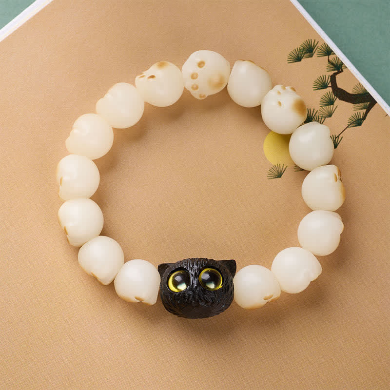 Buddha Stones 菩提樹の実と黒檀で作られた猫の足の形をした、清らかさと知恵を象徴するブレスレット - image 1