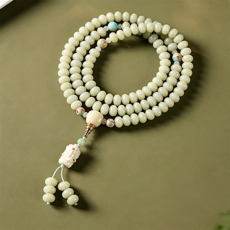 Buddha Stones 白い菩提樹の種をモチーフにした菩薩タラ・ホープの手織りエスニック108マーラー数珠 - image 1