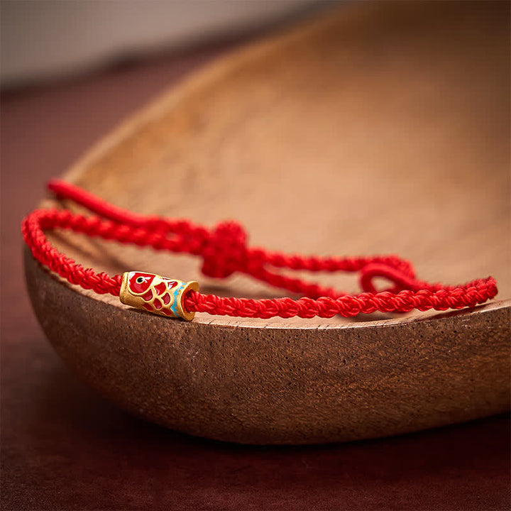 Buddha Stones 手織りの赤紐で鯉の幸運を象徴する編み込みコードブレスレット - image 1