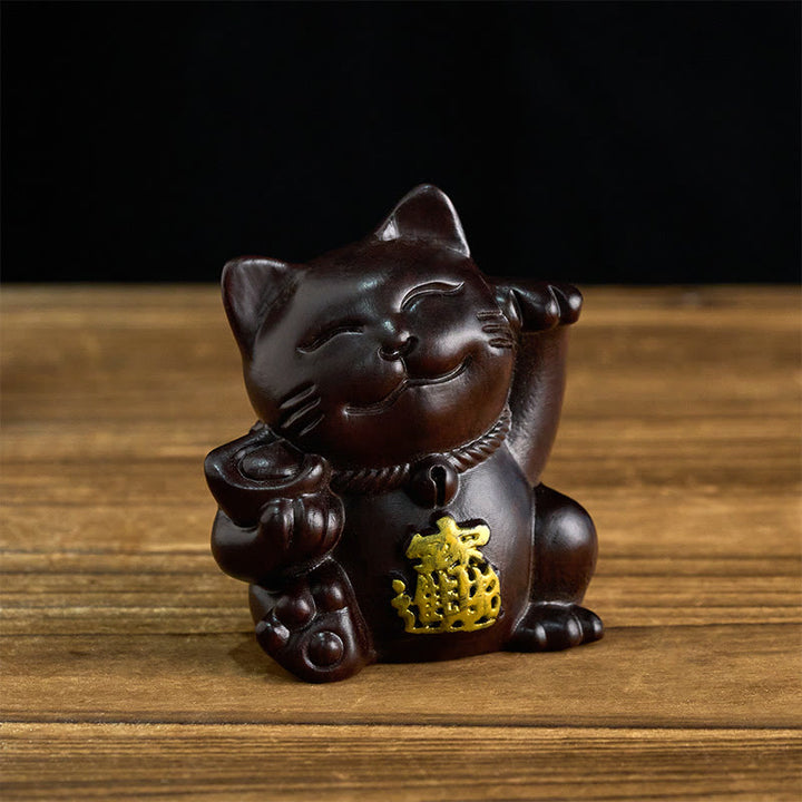 Buddha Stones 富を引き寄せる招き猫の黒檀彫刻の良縁祈願装飾 - 黒檀 - 20cm（色とサイズは異なる場合があります） - image 0