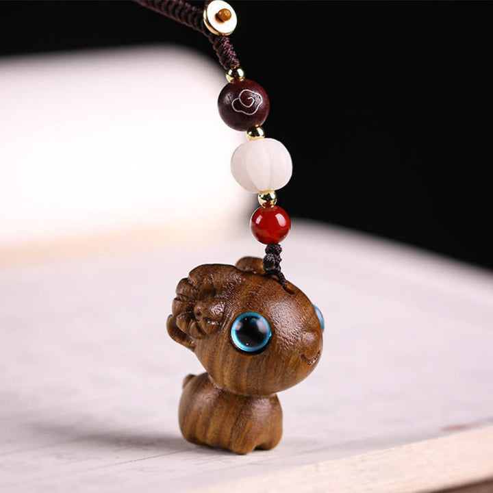 Buddha Stones 緑白檀製、羊の幸運をモチーフにした手彫りキーホルダー - image 3