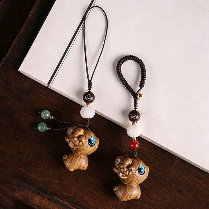 Buddha Stones 緑白檀製、羊の幸運をモチーフにした手彫りキーホルダー - image 4