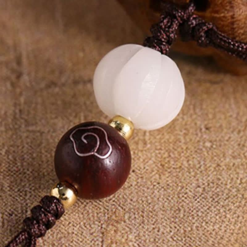 Buddha Stones 緑白檀製、羊の幸運をモチーフにした手彫りキーホルダー - image 9
