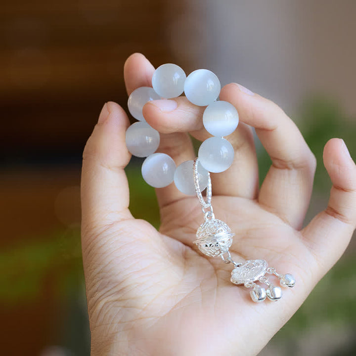 Buddha Stones 白いキャッツアイの鈴　如意運を高める触覚瞑想ビーズ装飾品 - image 1