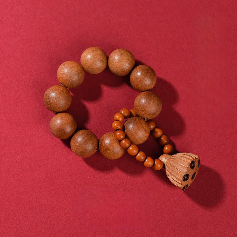 Buddha Stones 桃の木の蓮の実を模した、手磨き仕上げの触覚的な瞑想ビーズ装飾品 - 桃の木（守護♥浄化） - image 1