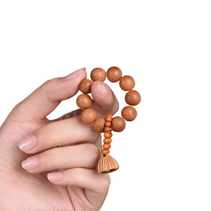 Buddha Stones 桃の木の蓮の実を模した、手磨き仕上げの触覚的な瞑想ビーズ装飾品 - image 3