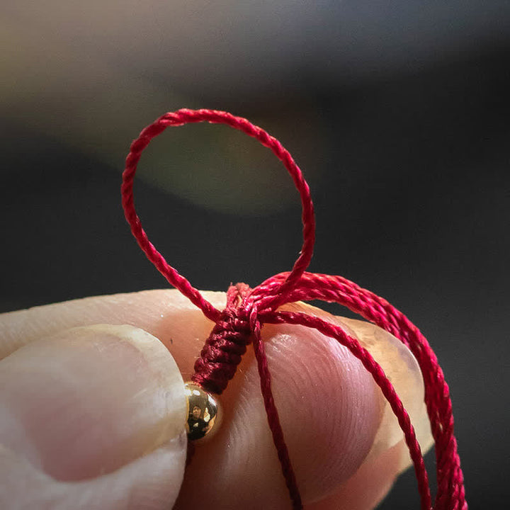 Buddha Stones 手織りのカラフルな赤紐で作られた、チベット風の調節可能なブレスレット - image 2
