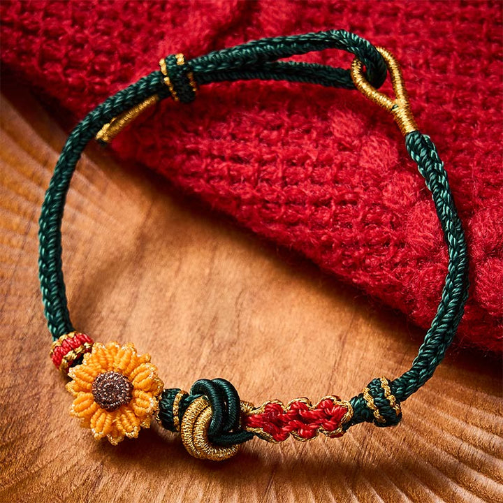 Buddha Stones 手織りの赤紐で作られた桃の花とひまわりの幸運ブレスレット - image 1
