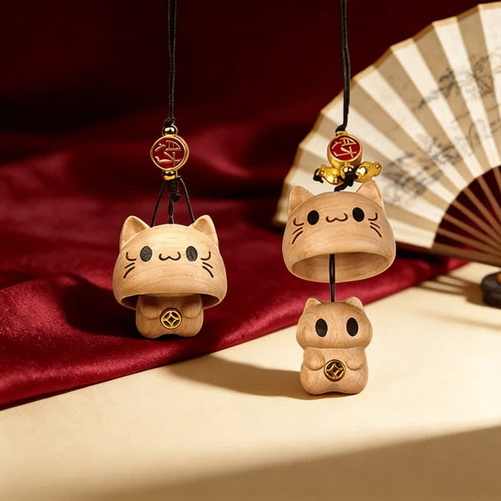 Buddha Stones 天然桃材彫刻のかわいい猫のバランスキーホルダー - image 2