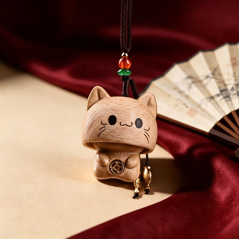 Buddha Stones 天然桃材彫刻のかわいい猫のバランスキーホルダー - image 1