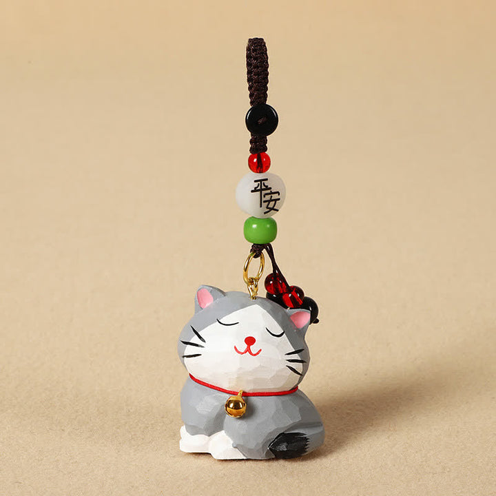 Buddha Stones 木彫りの猫オーム・マニ・パドメ・フムフォーカス キーホルダー - 穏やかな灰色の猫 - image 13