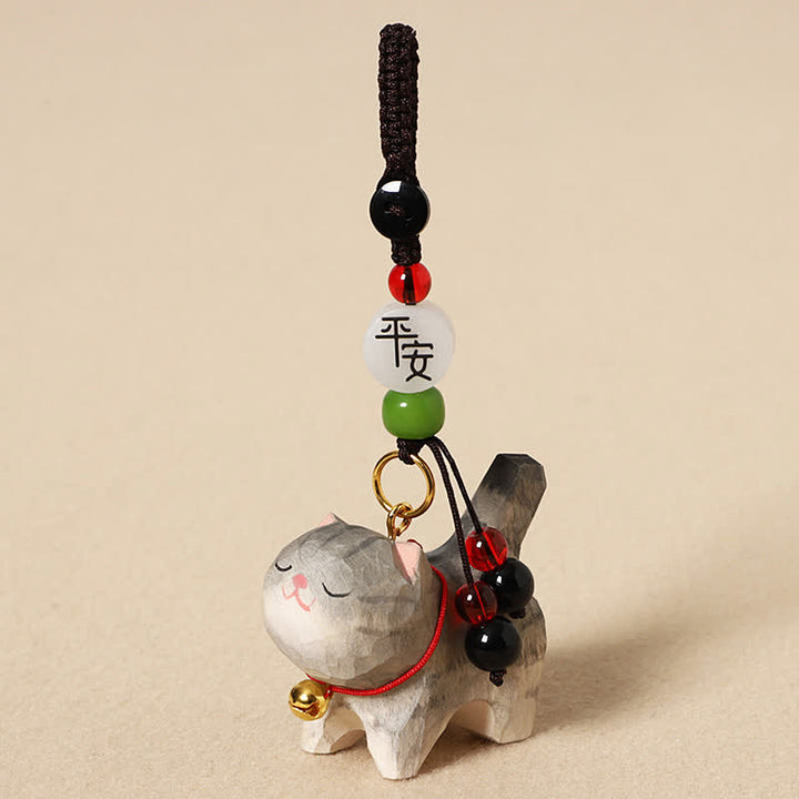 Buddha Stones 木彫りの猫オーム・マニ・パドメ・フム平和キーホルダー - 穏やかな灰色の猫 - image 1