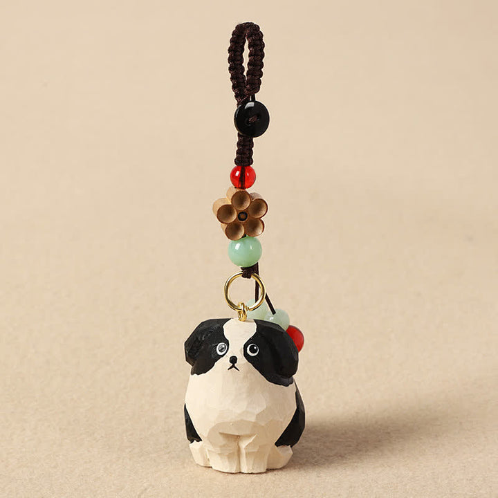 Buddha Stones 木彫りの犬オーム・マニ・パドメ・フム知恵のキーホルダー - 白黒の犬 - image 0