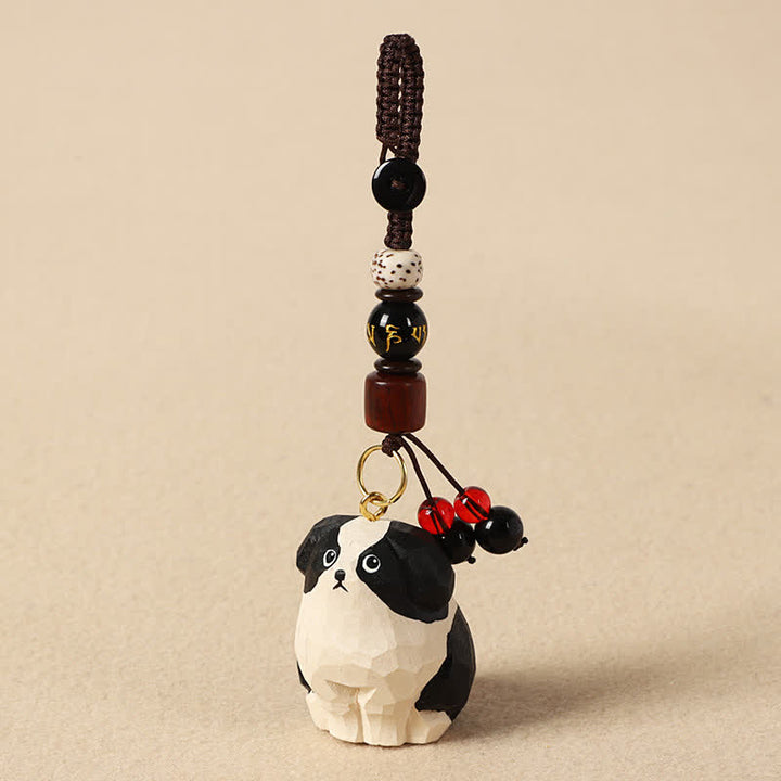 Buddha Stones 木彫りの犬オーム・マニ・パドメ・フム知恵のキーホルダー - オーム・マニ・パドメ・フム白黒の犬 - image 2