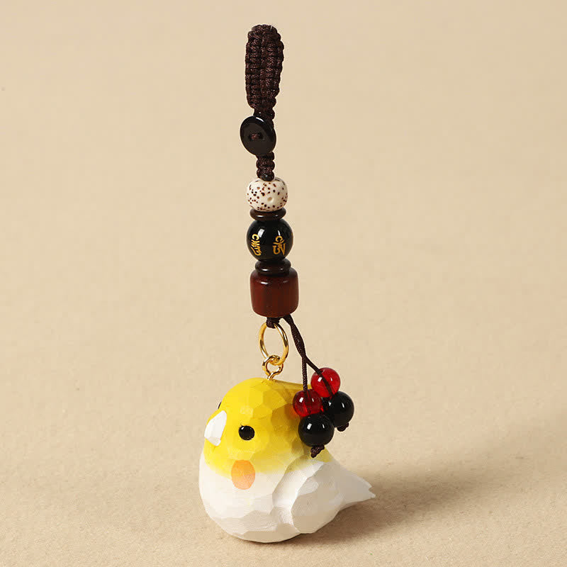 Buddha Stones 手彫りの天然木製オカメインコ「オーム・マニ・パドメ・フム」フォーカスキーホルダー - オカメインコオーム・マニ・パドメ・フム - image 0