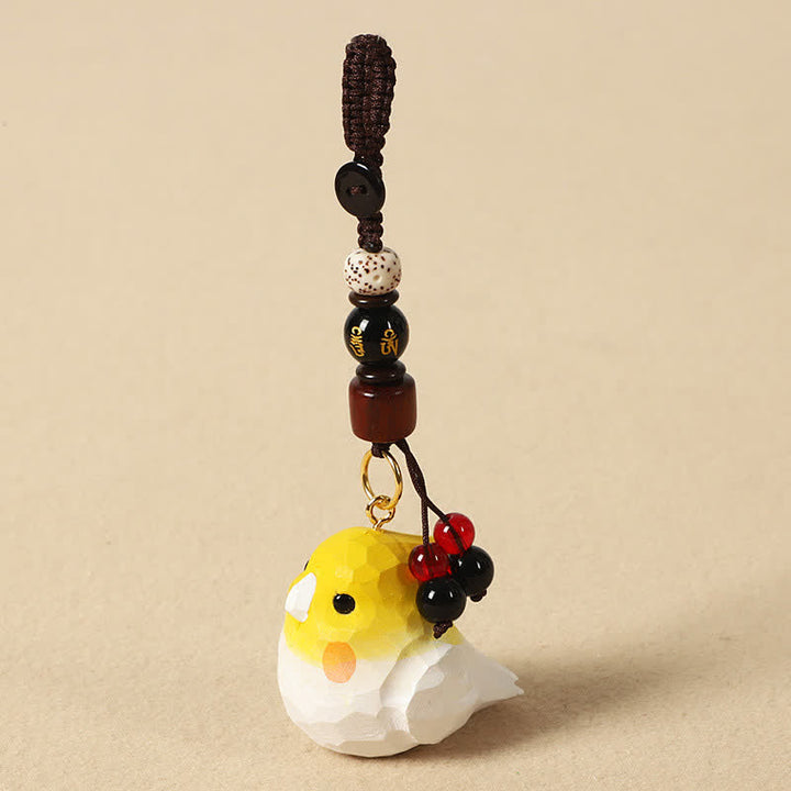 Buddha Stones 手彫りの天然木製オカメインコ「オーム・マニ・パドメ・フム」フォーカスキーホルダー - オカメインコオーム・マニ・パドメ・フム - image 0
