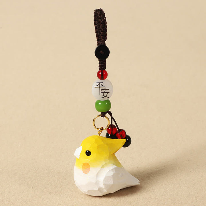 Buddha Stones 手彫りの天然木製オカメインコ「オーム・マニ・パドメ・フム」フォーカスキーホルダー - オカメインコの平和 - image 3