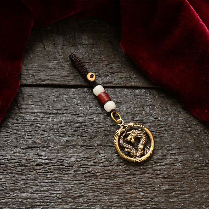 Buddha Stones 銅製龍の富を象徴する編み込みラウンドキーホルダー - 白いビーズコード - image 1
