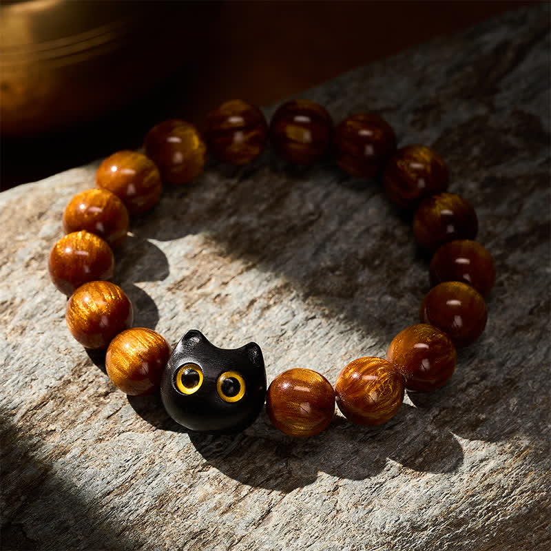 Buddha Stones 黄色の樹脂ビーズ、黄色の目、黒檀猫モチーフの落ち着いたブレスレット - image 3