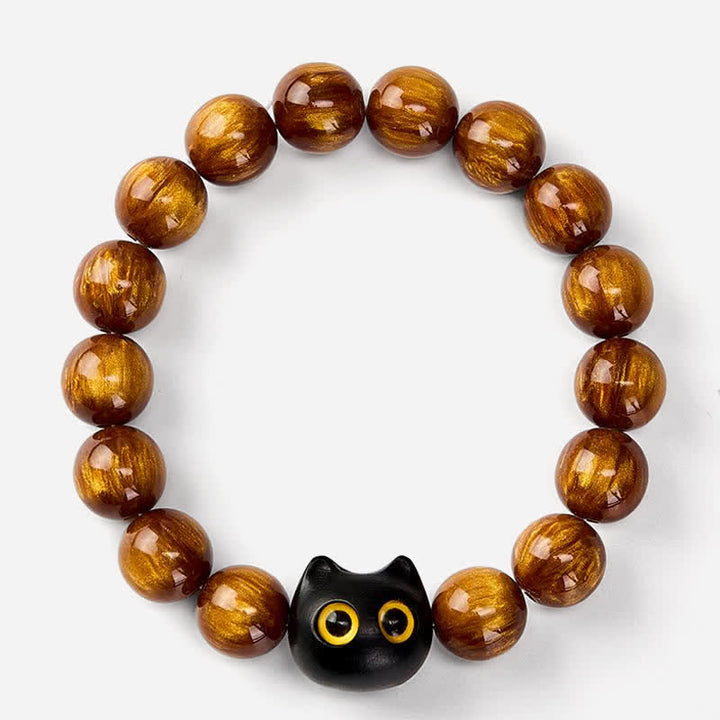 Buddha Stones 黄色の樹脂ビーズ、黄色の目、黒檀猫モチーフの落ち着いたブレスレット - image 2