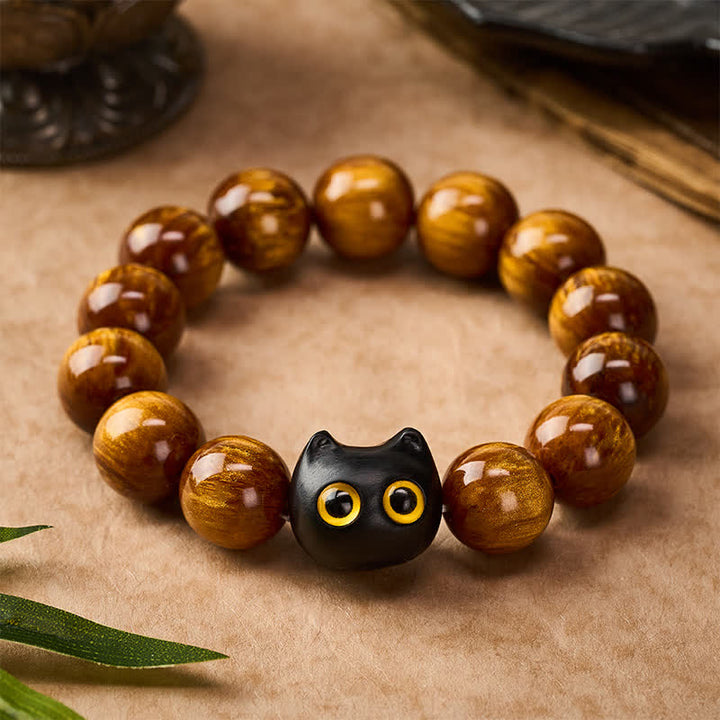 Buddha Stones 黄色の樹脂ビーズ、黄色の目、黒檀猫モチーフの落ち着いたブレスレット - image 10