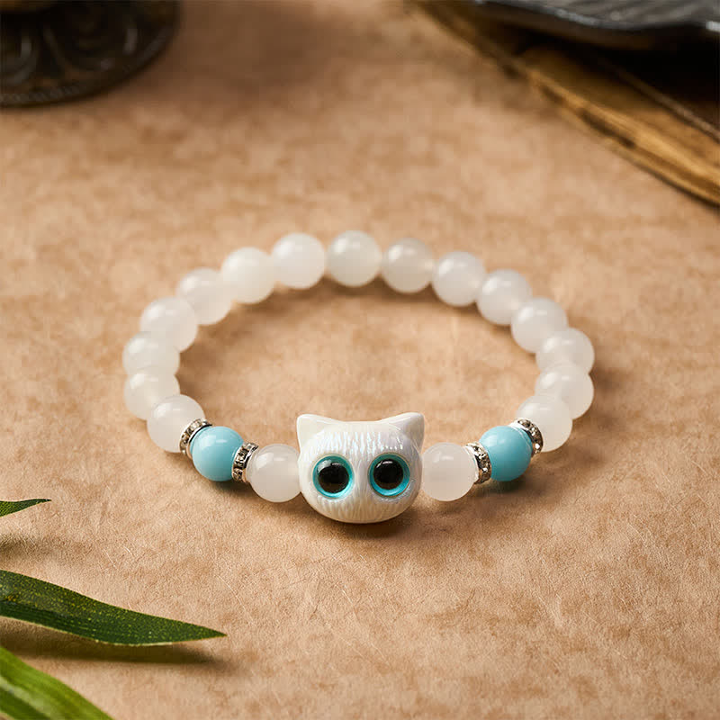 Buddha Stones ホワイトジェイドとブラックオブシディアンを使った猫の頭モチーフのピュリティビーズブレスレット - image 7