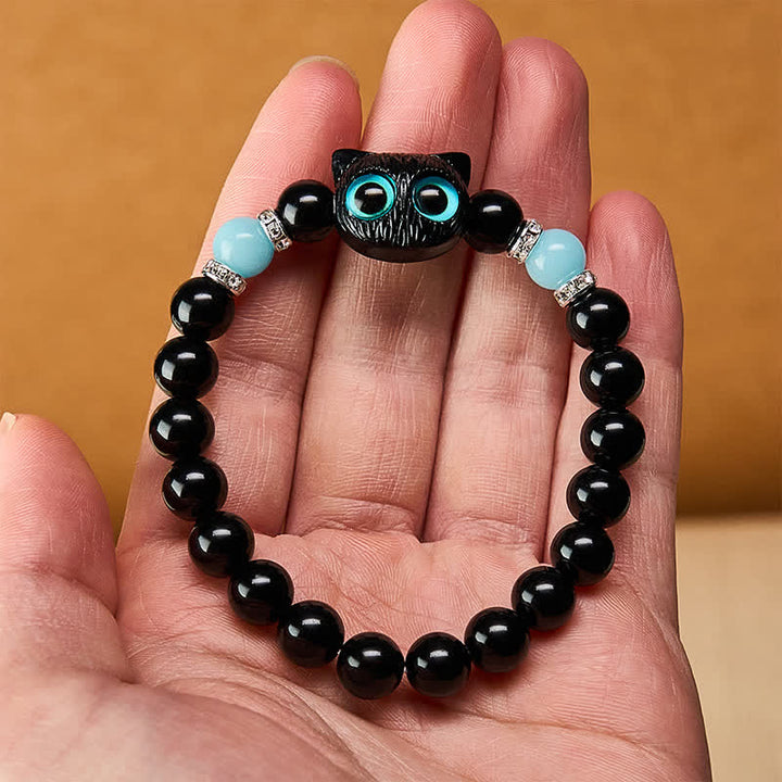 Buddha Stones ホワイトジェイドとブラックオブシディアンを使った猫の頭モチーフのピュリティビーズブレスレット - image 18