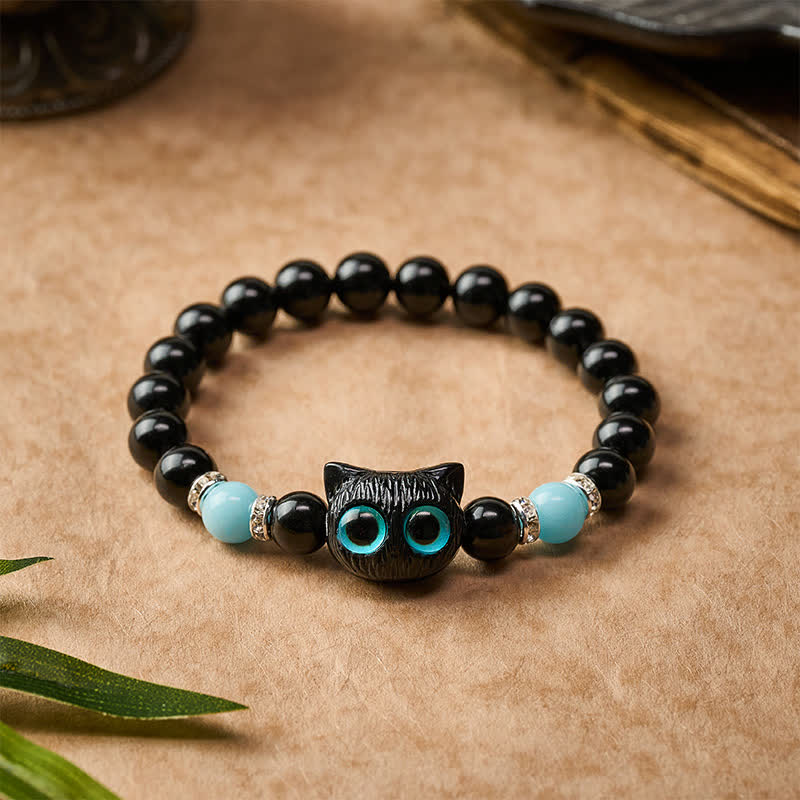 Buddha Stones ホワイトジェイドとブラックオブシディアンを使った猫の頭モチーフのピュリティビーズブレスレット - image 18