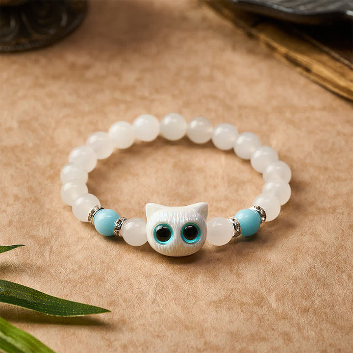 Buddha Stones ホワイトジェイドとブラックオブシディアンを使った猫の頭モチーフのピュリティビーズブレスレット - image 8