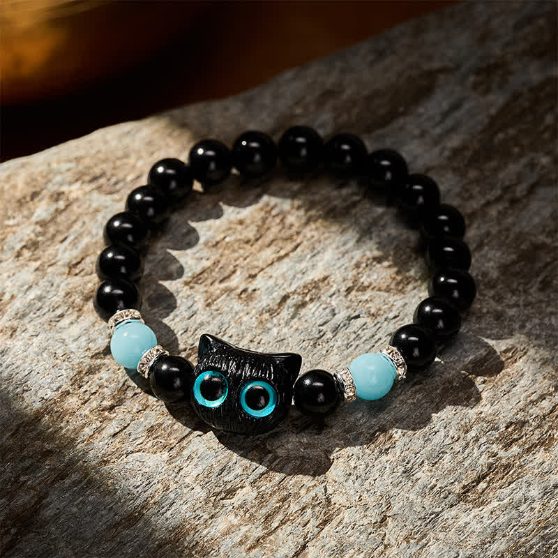 Buddha Stones ホワイトジェイドとブラックオブシディアンを使った猫の頭モチーフのピュリティビーズブレスレット - image 15