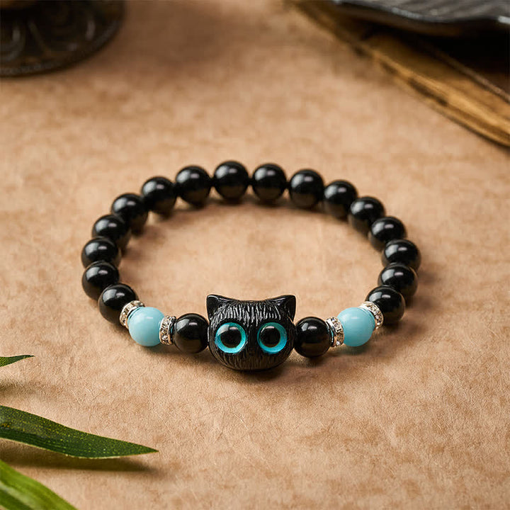 Buddha Stones ホワイトジェイドとブラックオブシディアンを使った猫の頭モチーフのピュリティビーズブレスレット - image 19