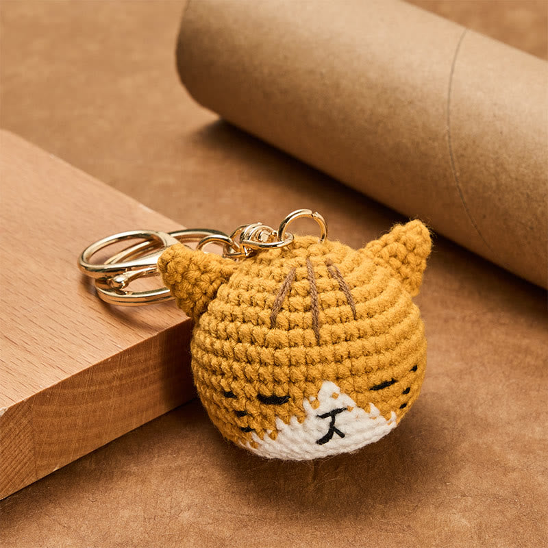 Buddha Stones 手編みかぎ針編みの猫の頭モチーフのバッグとキーホルダー - image 1